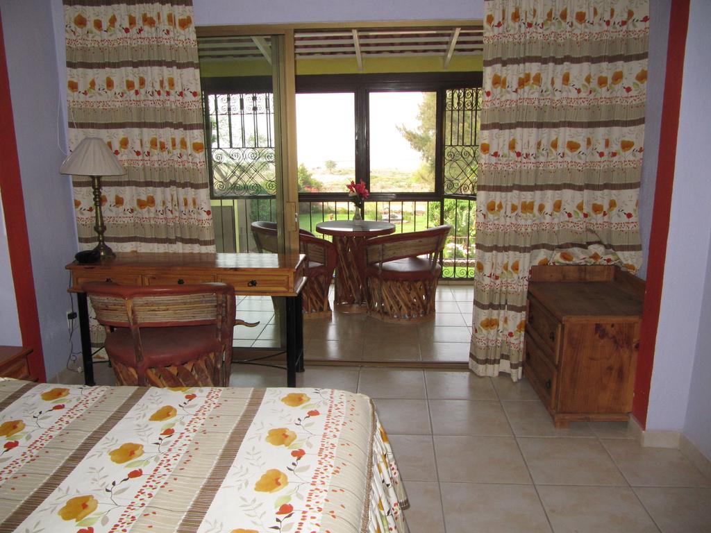 La Puerta Violeta Guesthouse & Spa San Juan Cosala Phòng bức ảnh