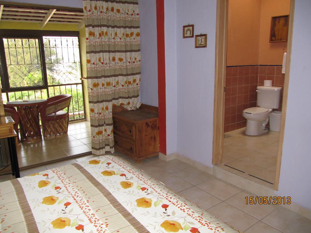 La Puerta Violeta Guesthouse & Spa San Juan Cosala Phòng bức ảnh